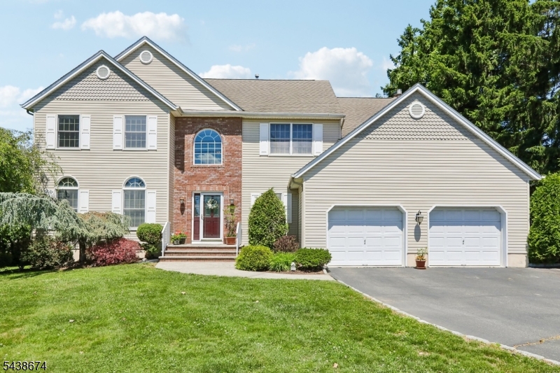 Welcome home to this beautifully maintained Center Hall Colonial in sought-after Fairfield. Set on a generous .51-acre lot, this 4-bedroom, 2.5-bath home offers a classic layout, spacious rooms, and the perfect blend of comfort and functionality.The main level features a formal living room, formal dining room, spacious eat-in kitchen that openly flows into the inviting great room, a half bathroom, convenient laundry room, and direct access to the attached 2-car garage. Just off the kitchen, a large Trex deck leads to a private expansive backyard which borders a cul-de-sac. This backyard creates the perfect setting for outdoor dining, entertaining, and relaxation. The second floor offers four generously sized bedrooms, including a spacious primary suite complete with a walk-in closet, additional storage room, stand-up shower, and jetted tub. A full bathroom serves the additional bedrooms. The unfinished basement provides ample storage space and flexibility for a variety of uses, whether as a recreation area, home gym, workshop, or additional living space. Additional highlights include a 2-zone HVAC system, whole-house attic fan, pull-down attic access to a spacious attic offering abundant storage, and an attached oversized 2-car garage. Located within the highly regarded West Essex Regional School District, this Fairfield home is also conveniently close to shopping, dining, parks, and major highways, providing an exceptional combination of space, comfort, and convenience.