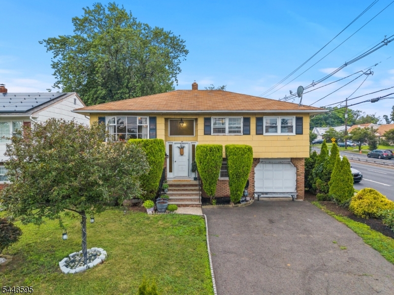Discover the perfect blend of comfort, style, and convenience in this beautifully maintained 4-bedroom,2-full-bath bi-level home, ideally located in the heart of Clifton. Featuring central air conditioning and a versatile layout, this home offers the flexibility today's buyers are looking for. The main level welcomes you with a bright and spacious living room that flows seamlessly into the formal dining room, creating the perfect setting for everyday living and entertaining. The renovated kitchen features modern finishes, ample cabinetry, and generous counter space. Three spacious bedrooms and a beautifully updated full bathroom complete this level.The ground level offers incredible versatility with its own living area, bedroom, full bathroom, and sliding glass doors leading directly to the fully fenced backyard. This flexible space is ideal for guests, a home office, recreation room, or a variety of other living arrangements.Perfectly situated just minutes from major highways, schools, shopping, restaurants, parks, and New York City transportation, this home combines space, convenience, and an unbeatable Clifton location. A fantastic opportunity to own a move-in-ready home with endless possibilities!
