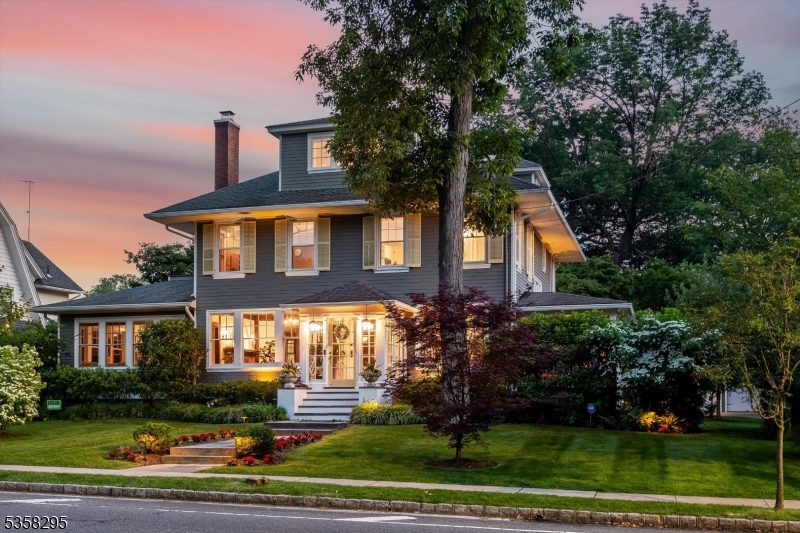 Exceptionally customized 7BR, 4.5BA beauty marries historic craftsmanship with today's luxuries, all in a convenient location minutes from town, schools, and Midtown Direct trains yet it lives like a private retreat on a lush half-acre. Original chestnut millwork, 9.5-ft ceilings, and French doors in almost every main-level room blend the line between indoor and outdoor elegance with entry to multiple decks, porches, and patios. At its heart, an entertainer's kitchen shines with pro-grade appliances, reclaimed cabinetry, and a 9 4-ft Carrara marble island. The sunlit living room, banquet-sized dining room, and large yet cozy den strike a perfect balance of gathering space and quiet escape. An attached 850sqft 1ST-FLOOR ACCESSORY APARTMENT with separate entrance, offers its own bedroom, living room, kitchen, and full bath ideal for guests or WFH studio. Upstairs, the vaulted primary suite feels like a boutique hotel: French doors to a private terrace, spa bath with original claw-foot tub, and tree-top views of ancient Japanese maples. Three more bedrooms and a hall bath complete the second floor; two additional bedrooms and full bath crown the third. "Under the hood : new roof, replaced plumbing and electric, dual-zone HVAC, water softener, irrigation system, and upgraded three-car garage. Four distinct outdoor living areas and oversized hot tub invite sunrise coffee, afternoons, and starlit parties. More than a house, this is resort-style living right at home, every day!