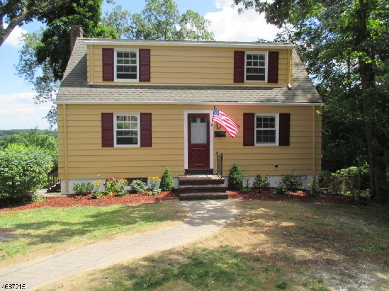 NEWLY Renovated Rental!! New hardwood flooring on 1st floor, berber carpet on 2nd floor, freshly painted throughout, clean as a whistle. Move right in! Ideal location. Walk to train, town & lake. 2 bedrooms on the first floor and large bedroom on the second. Versatile space for office area too. Newer appliances in kitchen (gas stove), walk out to the deck with beautiful views for your morning cup of joe & glass of wine at night. Newer windows, central air,oil or natural gas in house. Garage is oversized tandem style. Gas water heater. Additional storage in walkout basement to fenced yard. Private backyard area, could be great for gardeners. South facing, lots of sun. Wonderful area to call home. Enjoy all the amenities of lake living; swimming, boating, fishing, club events & lovely walks around the town.