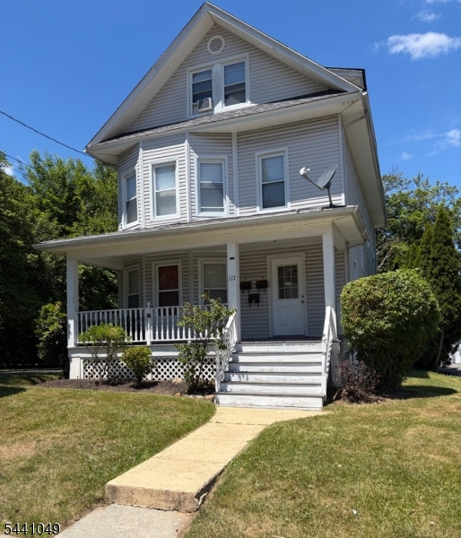 Well-maintained two-family home in a prime location! The first floor features five spacious rooms, including an updated eat-in kitchen with pantry, living room, three bedrooms, and a full bath. The second floor offers six rooms, updated eat-in kitchen, living room, can be bedroom with a walk-in closet or dining room, full bath,  and two additional bedrooms. The third floor includes four rooms and a full bath. The second and third floors are currently combined and rented as one unit, offering excellent income potential.  Current rents are below market value, The property is equipped with three separate utilities, boilers, and hot water heaters. Additional features include washer and dryer hookups in the basement and a large, park-like lot.Conveniently located less than 1/2 mile fron NYC transportation, shopping, restaurants, and other local amenities. All leases expire in August. A great opportunity for investors or owner-occupants alike!