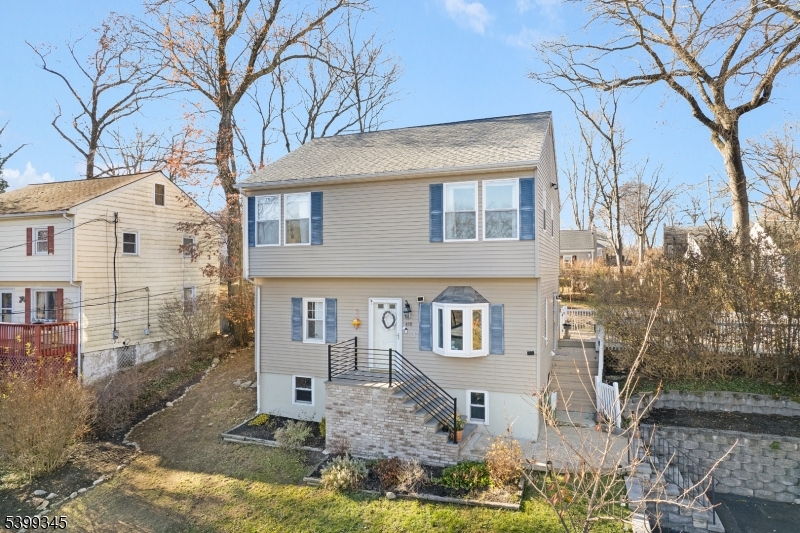 Available for move in IMMEDIATELY. PETS ALLOWED. Welcome to 499 Diamond Spring Road, a beautifully updated and lovingly maintained Colonial just moments from Rock Ridge Lake and Cooks Pond. Move right in and enjoy living in one of Denville's most central locations. Inside, you'll find generous room sizes, great natural light, and hardwood floors under the first-floor carpeting. The bright and inviting living area features a newer bay window with peaceful views of Tourne Mountain. The spacious country kitchen offers tons of cabinet space and room to cook and gather. The first floor includes a bedroom and full bath, offering flexible living options. Upstairs, the second level features three large bedrooms, a second full bath, and plenty of closets, storage, and attic space. Step outside to the oversized deck, perfect for entertaining, relaxing, or enjoying the privacy of your backyard. Off-street parking adds to the convenience. All just a short drive to downtown Denville, with its restaurants, shops, arts, music, and NYC-direct transportation. Located in a top-rated school district and close to nearby recreation, this home offers comfort, convenience, and exceptional value. A rare rental opportunity in a prime location   don't miss it! Available February 1.