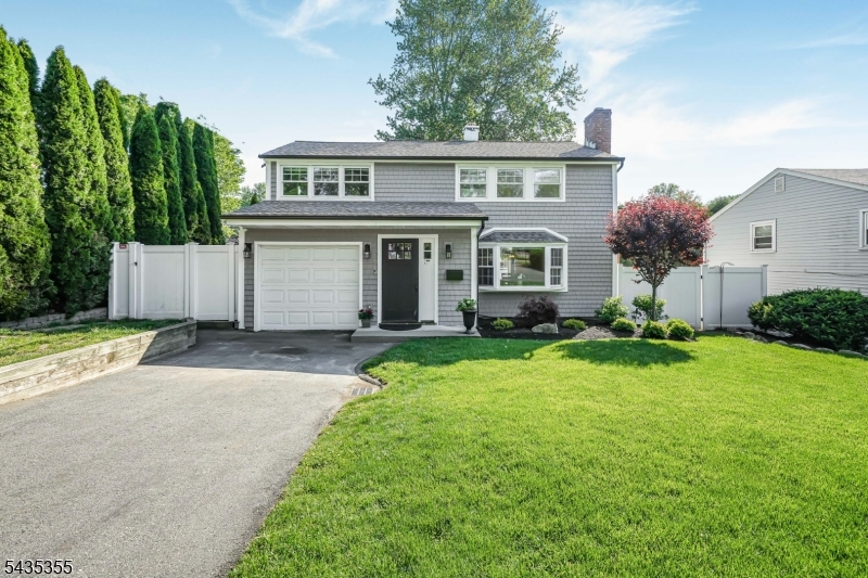 Welcome to 35 Stuart Street, where the charm of a classic Waldwick home meets the luxury and ease of completely modern living. Fully gut renovated in 2022, this stunning residence has been thoughtfully rebuilt from top to bottom, offering buyers something truly rare which is style, substance, and total peace of mind. Every major component of the home has been replaced including plumbing, electrical, sewer line, mechanicals, and systems throughout, creating the feel and reliability of new construction without sacrificing warmth or character. Inside, higher ceilings and sun filled spaces create an inviting and sophisticated atmosphere, while the beautifully designed chef's kitchen is sure to impress with custom cabinetry, premium Cafe appliances, and elegant finishes that make everyday living feel elevated. The seamless flow continues outdoors to a gorgeous paver patio perfect for entertaining or unwinding at the end of the day. Every detail of this home has been carefully curated so you can simply move in and enjoy a lifestyle defined by comfort, quality, and effortless living.