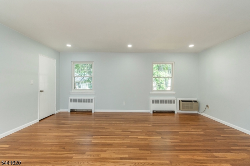 Welcome home to this beautifully renovated 2 Bedroom second-floor condo, where modern updates meet timeless charm. This move-in-ready unit has been completely refreshed and features a brand-new kitchen with stylish cabinetry and new appliances, making meal preparation both functional and enjoyable. The refinished hardwood floors add warmth and character throughout the home, while fresh paint creates a bright, clean, and inviting atmosphere. New radiators provide added comfort and efficiency, Washer and Dryer completing the extensive list of upgrades. Whether you're a first-time buyer, downsizing, or looking for a low-maintenance home, this turnkey condo is ready for its next owner. Simply unpack and start enjoying all the benefits of a fully renovated home. HOA Does not accept FHA, No Pets