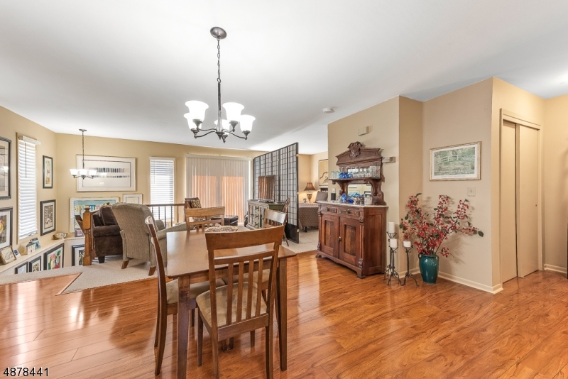 SPECTACULAR VALUE! UPDATED STUDIO STYLE END UNIT CONDO WITH FINISHED BASEMENT. UPGRADES INCLUDE, NEW KITCHEN APPLIANCES,NEW  CARPETING, FINISHED BASEMENT W/FAMILY RM & STORAGE FIRST FLOOR LAUNDRY W/WASHER/DRYER IN UNIT. FRESHLY PAINTED & IMPECCABLE KEPT! NICE SIZED DECK AND PLENTY OF PARKING. DONT MISS THIS  GREAT OPPORTUNITY! WONT LAST!! WATER AND SEWER INCLUDED IN ASSOC FEE. BOOKCASES AND STORAGE RACKS IN STOCK ROOM STAY.
