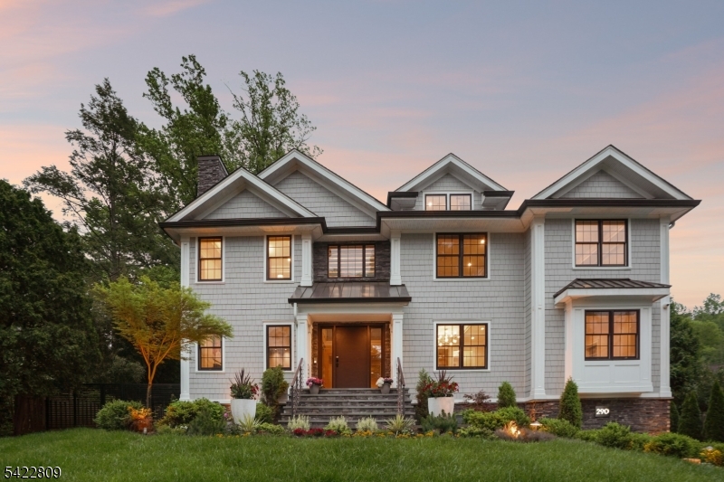 Welcome to 290 Long Hill Drive, an exceptional build completed in 2021. This blend of luxury, comfort & functionality is a labor of love. Sited perfect on over half an acre of Short Hills property with 7 beds & 8.1 baths boasts a heated saltwater pool w/ hot tub, gazebo & equipped custom outdoor kitchen! Soaring ceilings, gracious formal rooms with built-ins and gleaming hardwood floors invite you to share their light & warmth. The living room features  gas fireplace, large dining room with butler's pantry is perfect for holidays & dinner parties. The heart of the home features a custom walnut and stainless steel chef's kitchen outfitted with top Miele appliances, 4 electric ovens, a steamer, 2 cafe-style refrigerators, & 2 dishwashers. Large eating area makes hosting a pleasure and the spacious family room with built in cabinetry & sliders to the backyard create an elegant lifestyle while the Sonos speakers enhance the experience. Spacious guest suite, private office & guest powder room complete the 1st level. The 2nd floor hosts 5 en suite bedrooms with heated bathroom floors & ample closets. The primary features a comfortable bedroom leading to private deck, luxurious bathroom & custom closet! Spacious 3rd level provides flex space perfect for a home office/recreation room. The lower level, a home theater, wine cellar & music room elevate your living alongside a private gym & rec area. An en suite bedroom & laundry complete this level. This is luxury living at its finest.