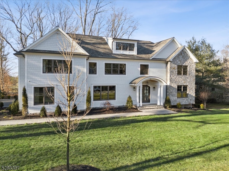 This one-of-a-kind home sets the standard for luxurious living.Nestled on 3/4 an acre, the home boasts 7BRs,7full & 2half baths.Overlooking Chatham's prestigious golf course, the property offers breathtaking sunset views that can be fully appreciated from both the primary bedroom & the spacious FR, both open to private, covered patios.The integration of clear railings enhances the unobstructed views, while oversized ceiling fans & a stunning stone fireplace create an ideal outdoor retreat.The heart of the home is its gourmet kitchen. Equipped w/Wolf &SubZero appliances, dual dishwashers, expansive island &custom cabinetry, the kitchen is a culinary playground.The adjoining dining room exudes elegance with its natural stone wine wall & wet bar-perfect for showcasing fine wines & spirits.The FR offers an elevated sense of comfort,featuring a dry bar, coffered ceilings & a natural gas FP framed in sleek quartz, exuding warmth & sophistication.The 1st floor is completed by a generously-sized LR, an in-law suite w/a full bath,mudroom w/custom lockers & a 3 car garage. The 2nd floor is home to 5 BRs,each w/its own en-suite bath.The finished 3rd level provides flexible space perfect for a variety of uses. The lower level retreat features a wellness room, recreation area, kitchenette, media room & an additional BR with full bath.Thoughtfully designed across multiple levels;t his is not just a place to live,but a sanctuary where elegance,luxury &functionality seamlessly come together