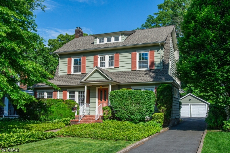 PRIME MONTCLAIR LOCATION! Just 4 blocks from Walnut Street Station & Midtown Direct train to NYC, this freshly painted quintessential center hall colonial is full of charm offering versatile living & potential! Formal living & dining rooms, newer eat-in kitchen w/ modern finishes & ample cabinetry, half bath, sunroom, as well as a jaw dropping 1st flr primary suite (w/ sizable full bath & walk-in closet, currently used as expansive fam room ideal for day to day living or entertaining). Upstairs features 3 bright bedrooms, vintage full bath + stairs to a sprawling attic perfect for storage/future expansion. Enormous finished basement offers laundry/storage/utilities/full bath + flexibility for home gym/office/rec room/den/play space. 2-car garage, long driveway, mature plantings, paver patio, lush yard. Truly a commuter's dream just waiting for your design eye! Easy access to shops/eateries/parks/magnet schools near Walnut Street & Watchung Plaza - enjoy all this town has to offer!