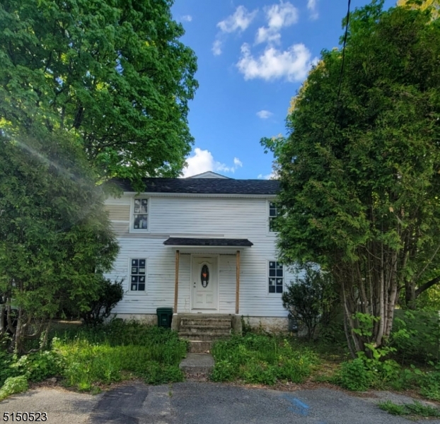 INVESTMENT OPPORTUNITY TO MAKE THIS HOUSE YOUR OWN!! 4 BEDROOM 2 FULL BATH COLONIAL THATS OVER 2,000 SQUARE FEET IN GREAT LOCATION IN THE LONG VALLEY SECTION OF WASHINGTON TOWNSHIP. HOUSE HAS BEEN GUTTED AND IS READY TO BE STARTED ON. ANY MATERIALS IN THE HOME IS THE BUYERS TO KEEP. HOME IS SERVICED BY PUBLIC SEWER AND WATER!!
