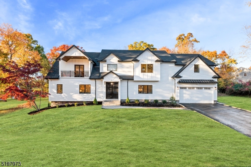 Welcome to this modern entertainer's paradise situated in the heart of Livingston. This custom colonial features finest of finishes & amenities one could want in luxury living. This 5 bed w/office 4.2 bath stunner offers maximum comfort and features bright and airy spaces with inviting ambiance perfect for everyday living The open- concept main floor offers elegant rooms with double story entrance foyer, gleaming wood floors & custom moldings.. The ultra-modern chef's kitchen with quartz counters, center island, high end SS appliances, custom cabinets, and spacious walk-in pantry. Family room has high ceiling, fireplace and access to outdoor deck and patio which allows for everyday enjoyment. Main level has exquisite design accents with an office, en-suite bedroom , powder room, coat closet and a mud room that connects with 2 car garage. Second level offers a spacious primary suite, with high ceilings, large windows and a separate sitting area/office. 2 walk-in-closets and spa inspired bathroom with a spacious shower, separate soaking tub and double vanity completes this space. This level also has en-suite bedroom plus two other bedrooms and a hallway main bath. Laundry room is conveniently located on this level. Partial finished lower level offers powder room & entertaining area. Conveniently located to shopping, NYC transportation & major highways. This home is not be missed!