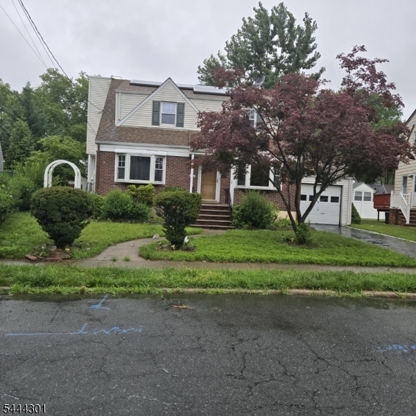 Expanded brick-front Cape, with lots of rooms for everyone. Excellent Location in nice quite tree lined streets yet close to all the Hiways, Transportation and easy access to NYC. All the shopping is very close by. Very Deceiving from the street, you must see inside to see the 2 floors Extension built in the back of the home which added Huge 1st floor Family Room 24X15 with Fire place and access to Huge deck and Fully Fenced Park like Back Yard. the addition also Created 2nd floor Primary bedroom Suite 21x15 and 2nd family/ recreational room Area 24x15 use it as Office, Play and gaming room. Huge Eat in Kitchen with access to side door and Yard, 1st floor Bedroom with Full Bathroom, Partially finished basement adds plenty of space for living, storage and Laundry. Many Recent updates make this purchase a home run Roof and solar new in 2023, new air conditioning and water heater in 2025. See floor plans, schedule your private showing anytime.