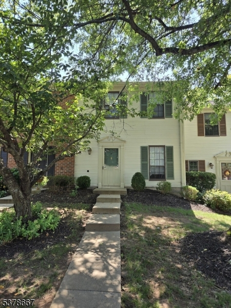 Great townhouse and location to make your next home! Upper level has two bedrooms each with their own full bath and laundry with full-sized washer and dryer. Main floor has open concept living and dining room, a powder room, and kitchen with a gas range, dishwasher, and refrigerator. Sliders from the living room lead to a semi-private backyard area. One assigned parking space with plenty of non-assigned spaces. This nice community has a pool, tennis courts, and sidewalks for strolling and jogging. Convenient to shopping, dining, highly rated schools, NJ Transit train service, and routes 287, 22 and 78. The interior will be professionally painted and cleaned, available Sep 15. Income verification and credit required, tenant pays first $100 of each repair.