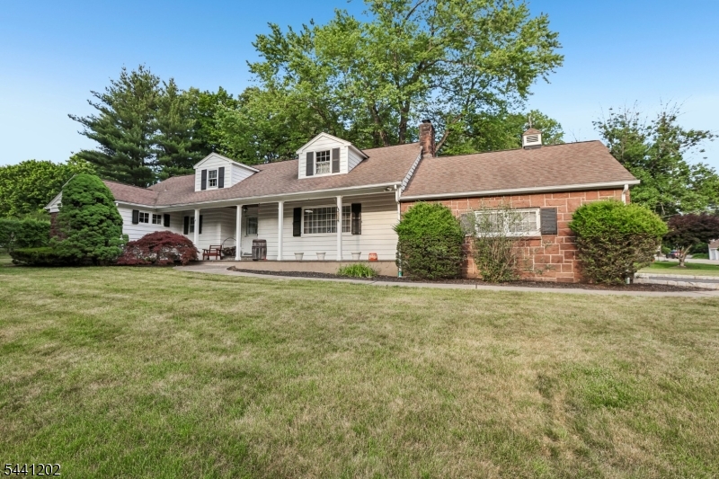 Nestled in one of Woodcliff Lake's most coveted and serene neighborhoods, this Colonial presents a rare opportunity to own a 233 X 173 flat parcel of Bergen County prime real estate overlooking a private lake. The home features 4 bedrooms, with the possibility of a 5th, 2.5 baths, a living room with fireplace, large country kitchen with SGD opening to the patio and yard, formal dining room a basement with bilco doors and a 2-car attached garage. The house has endless possibilities, add a level or extend out or just update as you see fit!. Enjoy the convenience of being near transportation, shopping, schools, parks, town pool and houses of worship. Amenities include CAC, first floor hardwood & a 2 car garage