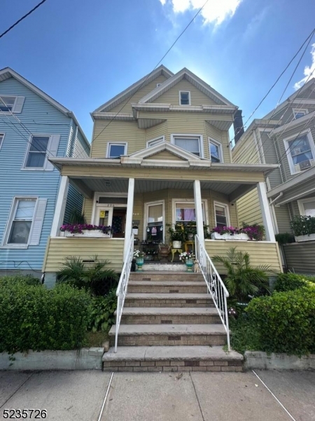 A beautiful  2 family home in a convenient location. Close to everything .It has 3 bedrooms in each unit and a full half finished  attic .