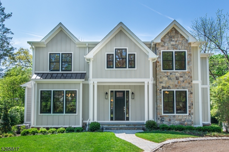 Exquisite new construction by award-winning architect Thomas Baio and renowned interior designer Karen Wolf of K+Co Living, this Short Hills residence is a masterpiece. The luminous entrance foyer, adorned with beautiful trim details, sets the stage for a suburban retreat. Expansive fl plan reveals a superior Custom Kitchen with expansive, 2 tier island, gorgeous walk-in pantry, wet bar, 2 dishwashers, 2 sinks, and premium Sub Zero & Wolf appliances. Custom millwork, tile details, and white oak flooring add a touch of sophistication throughout. First floor accommodates a formal dining rm, living rm, office, and convenient in-law suite. Kitchen seamlessly connects to a luxurious breakfast and sitting area, extending into family rm. Second fl boasts five generous br, including a remarkable PRIMARY SUITE with custom vanity, fireplace, and walk-in-closets. Additional highlights include a loft area and a conveniently located laundry rm. The basement is an entertainment haven, offering an enormous recreation rm and a br with a full bath. Enjoy outdoor living on the elevated patio overlooking a charming yard with extensive privacy landscaping. This home is within the coveted Millburn school district, near top-ranked Glenwood Elementary, a thriving downtown, and offers an easy NYC commute with steps to the train station. Access to major highways and EWR Airport in under 20 minutes makes this property an unparalleled opportunity. Just completed and ready for you to move right in!