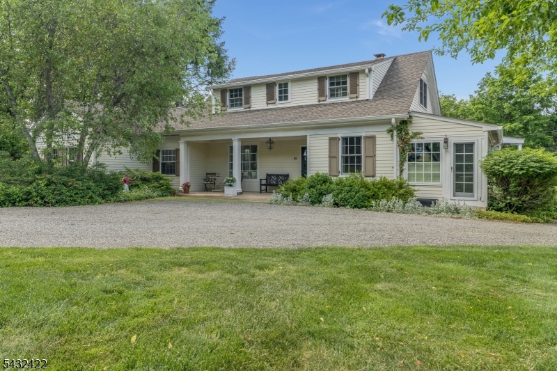 ABSOLUTELY CHARMING UNIQUE home with beautifully maintained gardens that will captivate you from the moment you pull into the driveway. Many  updates by current owner include an incredible Kitchen with Viking Professional Grade appliances, oversized center island,  custom cabinetry w/English Bridal Leather draw handles, cookbook shelving, spacious spice rack and Dutch engineered wide plank flooring complete this amazing room.  The full bathrooms have also been totally  renovated with tile showers and one w/ a  relaxing soaking tub . Additional special features include wood flooring throughout, Anderson windows in the front of the house, high ceilings, a bright sun room that is a perfect place to relax after a long day. Added bonus - 2 car oversized garage with double doors provide a very spacious storage area.  This picturesque, inviting home with its unique front porch is truly a "Perfect Country Retreat" in the heart of Mendham!!!  Top Rated town and school systems plus close proximity to the popular  town of Morristown, NYC train line and major interstate highways provide the best of both worlds!!! Make an appointment today, you won't be disappointed...