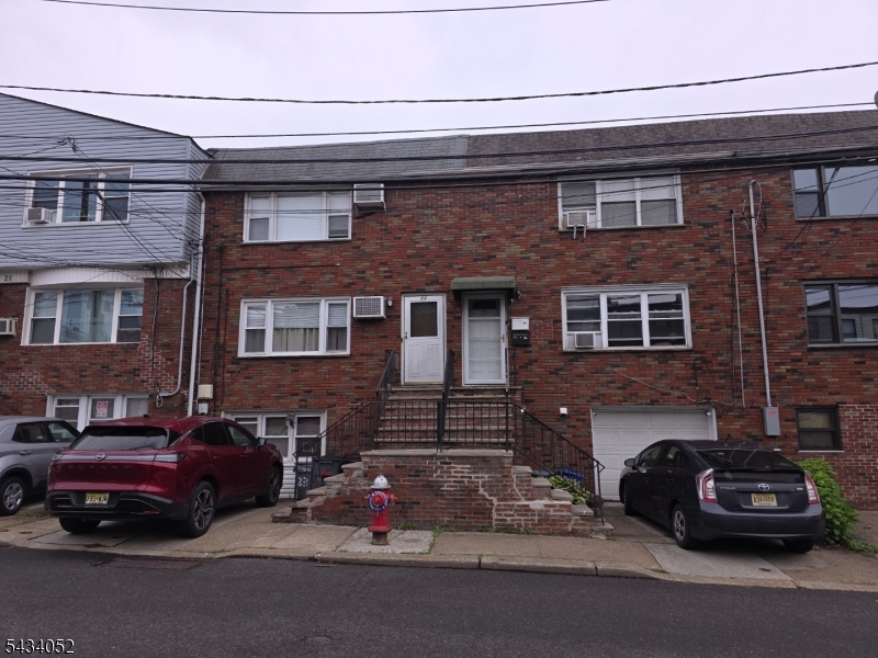 Don't miss this incredible investment opportunity in the heart of Jersey City's Journal Square neighborhood! This well-maintained two-family home features two spacious units, each with 2 bedrooms, 1 full bathroom, and a finished basement with an additional bathroom offering flexible bonus living space. The property also includes one dedicated on-site parking space. Whether you're an investor seeking steady rental income or an owner-occupant looking to live in one unit, this property delivers.Situated about two miles from Historic Downtown Jersey City and just ten miles from Manhattan, Journal Square is a centrally located and growing neighborhood with easy access to major highways and the PATH train, making it a magnet for commuters and renters alike.