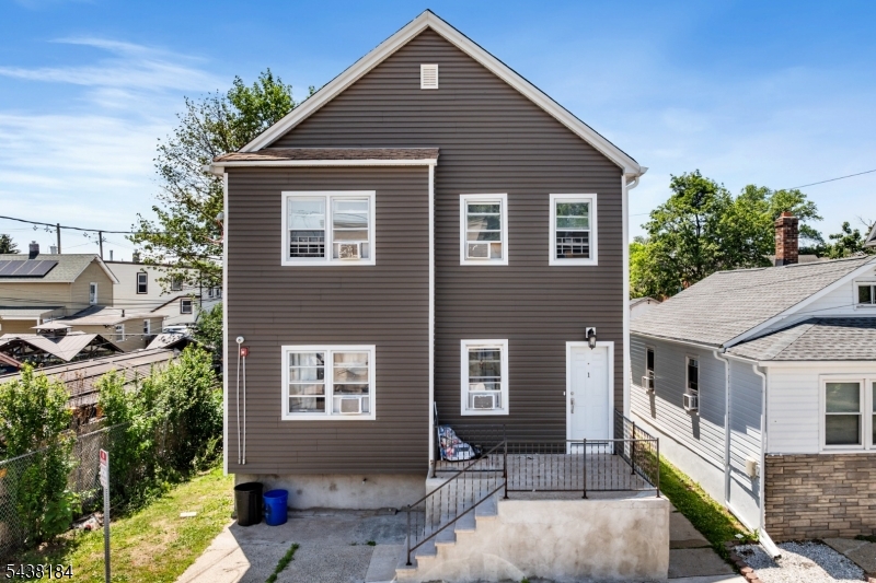 Investor alert! Rarely does a fully occupied, CASH COW 4-unit come to market in this condition. All four units are thoughtfully laid out with two bedrooms, one bath, and gleaming hardwood floors throughout, making them highly rentable and easy to maintain. The property has been updated with brand new vinyl siding, offers a large unfinished basement ideal for storage, and features a nice backyard, a sought-after bonus for tenants. With four quality tenants in place, tenants paying electric, and professional management already established, the heavy lifting is done. Grossing $82,680 annually with all units currently occupied, this is a true turnkey addition to any portfolio. Ideally located in Manville with strong rental demand, savvy investors will recognize the value here immediately. Don't miss your chance to own a stabilized, income-producing asset that checks every box.