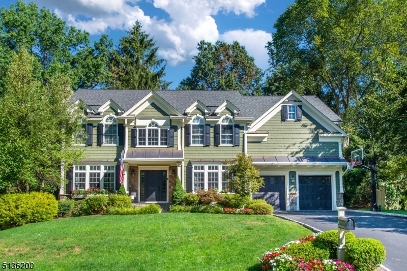 This impeccably built home is the definition of bespoke sophistication.  Featuring a grand 2-story foyer, custom millwork throughout, coffered ceilings, inlaid wood floors, gourmet kitchen, backyard sanctuary, recently renovated Primary Bathroom and much more.  6 Country Club Drive is located in the prestigious Rolling Hill Section of Chatham Township, with convenient access to highways and rail. With 6 bedrooms and 6 full, 1 half bath, this home is grand yet inviting.  Special features include: First floor bedroom with ensuite bathroom, large mudroom with entrance to/from garage or back deck, breathtaking custom reclaimed wood floors in kitchen, impressive basement with wine cellar, game room/billiards, bar/lounge and gym/workout studio with full bathroom.