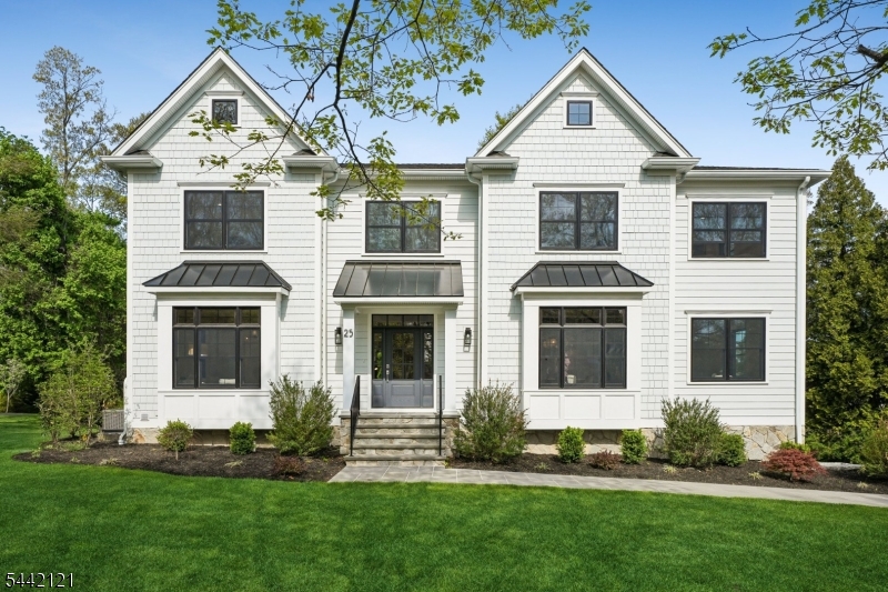 All-New Luxury Construction in Madison's Prestigious Hill Section. Experience the pinnacle of craftsmanship and modern sophistication in this breathtaking 7-bedroom, 7.5-bath home.Built to the highest standards, this residence features 9' ceilings, 4" white oak hardwood floors, and custom millwork throughout. The main level offers a formal living and dining room with detailed trim, a butler's pantry, and a gourmet kitchen with Wolf/Sub-Zero appliances, quartz countertops, custom cabinetry, two refrigerator drawers, and a walk-in pantry. The open-concept family room with gas fireplace leads to a Trex deck. A first-floor office and ensuite bedroom provide versatility for guests or work-from-home living. Upstairs, the primary suite is a retreat with a tray ceiling, gas fireplace, expansive walk-in closet, and a spa-inspired bath featuring radiant heated floors, free-standing tub, and oversized shower. Four additional ensuite bedrooms all featuring built-in closets. A well-appointed laundry room complete the second floor.The finished basement offers a large recreation room with built-ins, a gym, bedroom, and full bath. Additional highlights include a Generac generator, 3-car garage, multi-zone high-efficiency HVAC, full home entertainment/security wiring, spray foam insulation, and enhanced soundproofing. Every detail showcases exceptional quality, comfort, and design. 25 Beverly is luxury living at it best! Exceptional value and unmatched by any new construction home in the area