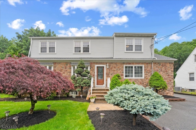 Welcome home to this beautiful 5 bedroom, 3 bathroom colonial in North Haledon. Sprawling living room gives way to modern eat-in-kitchen with four-foot granite breakfast bar. Formal dining room and oversized primary suite with walk-in closet and full bathroom complete the first floor. Second floor features enormous second primary suite with massive walk-in closet along with three more large bedrooms. Finished basement with laundry and storage. Driveway with parking for six cars and one-car garage with plenty of space for storage sits next to the spectacular fenced backyard featuring pergola, screened canopy, hot tub, turf golf area, patio with grilling area AND fire pit. Close to shopping, parks and schools. Don't miss out on the chance to make this home your own! ATTENTION: HIGHEST AND BEST DUE WEDNESDAY 6/3 AT 6 PM.
