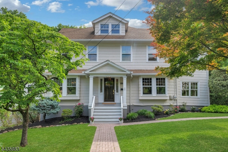 Timeless character, exceptional space, and an unbeatable location come together in this distinctive Summit residence. Set on a generous, level lot just moments from downtown Summit, .4 mile from Summit's NJ Transit Station, and .2 mile from top-rated Lincoln-Hubbard School, this home is filled with the architectural details today's buyers cherish. High ceilings, original moldings, and gracious proportions create a sense of elegance and warmth throughout. Oversized formal and informal rooms provide the ideal setting for both everyday living and entertaining. The expansive kitchen serves as the heart of the home, offering abundant workspace and gathering space while overlooking the gorgeous backyard, an inviting retreat for dining al fresco, play, or peaceful relaxation. A coveted three-car garage provides exceptional convenience and storage, a rare offering in this sought-after neighborhood. Rich in character and thoughtfully designed, the home offers the perfect canvas to enjoy as is, renovate to reflect your personal style, or reimagine over time. Whether you're drawn to its timeless architectural charm, generous room sizes, spectacular yard, or the possibilities it presents, this is a special opportunity to create your next chapter in one of Summit's most sought-after neighborhoods.