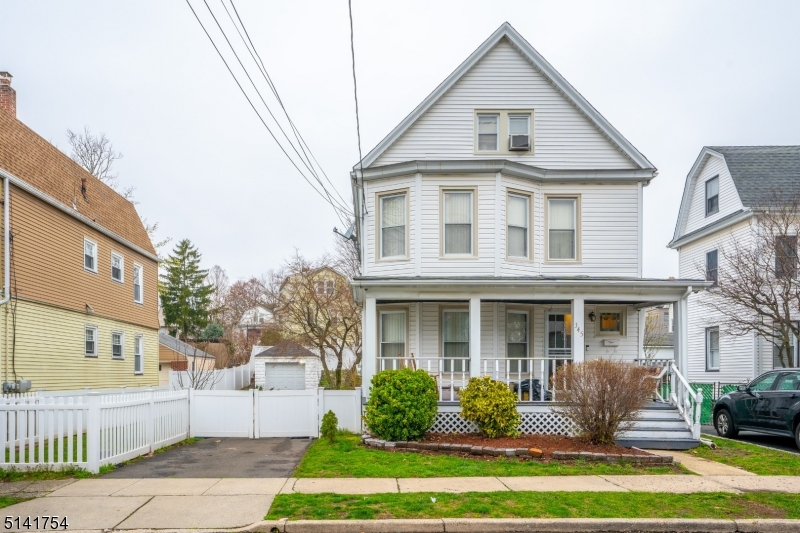 Gorgeous, updated colonial in prime LOCATION in Bloomfield! Located in the heart of Bloomfield, blocks away from the Bus stop to NY and Jitney to the train station, this 4 beds/2 baths beauty is ready for new owner. Inviting open front porch gives access to the first floor of this beautiful home with a great size living room, dining room, renovated kitchen with SS appliances and granite counter tops, and one good size bedroom. Full finished basement with wet bar, great for entertaining, family room and full renovated bath. Second floor with huge master bedroom and lots of closet space! office space and 3rd bedroom on second floor as well as full bath with jetted tub and double sink. Third floor with 4th bedroom. Huge fenced in yard, with paver patio great to enjoy upcoming summer days. Long driveway with space for 4+ cars and full detached garage. Conveniently located,  easy access to major highways and shops. This is a must see!