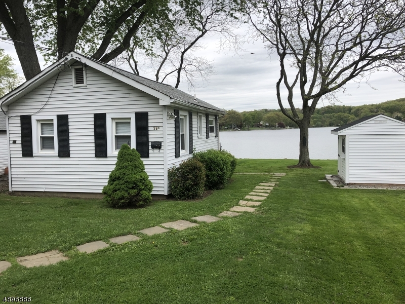LAKEFRONT, LAKEFRONT, LAKEFRONT. Enjoy the amazing views all year long from this quaint lake front cottage. Enjoy privacy of the single family structure, with a private yard. Enjoy the close proximity of the train station, bus stops, shopping, rt 206, rt 46, rt 80 and rt 10. 8 x 8 Shed available to tenant for storage .