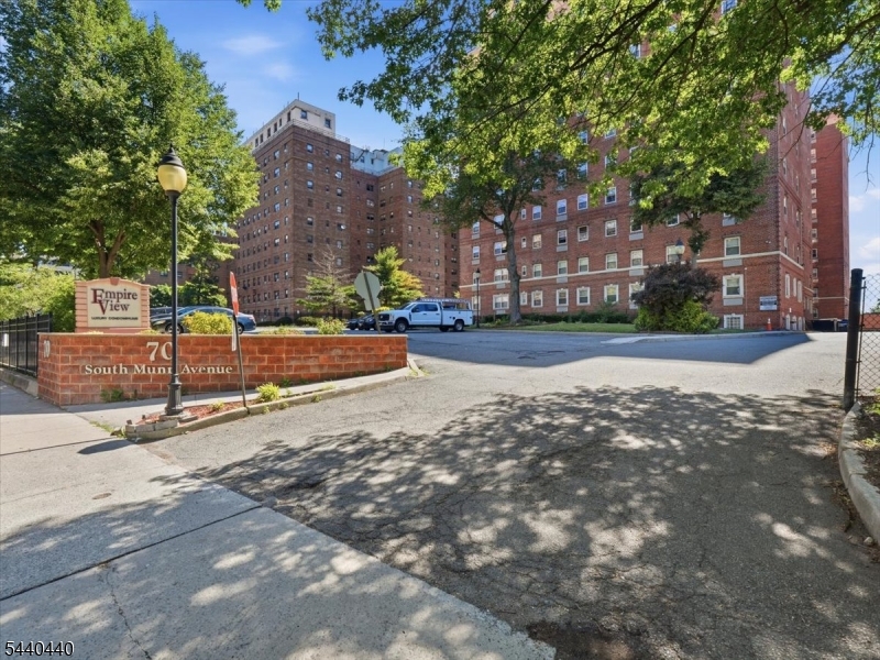Welcome to Empire View Condos, one of the area's most sought-after buildings. This well-maintained 680-square-foot, fourth-floor condominium offers 1 bedroom and 1 bathroom with a functional layout designed for comfortable living. Features include hardwood floors, an open living and dining area, a spacious bathroom, and a galley kitchen featuring a newer three-door refrigerator, Bosch appliances, a stackable washer and dryer, gas stove, and dishwasher. The unit also includes the convenience of in-unit laundry with a washer and dryer. Assigned parking space, storage unit in the basement. Residents enjoy 24-hour concierge and security services, a fitness center, and a community room. Affordable living yet close enough to work in NYC. Ideally located just two blocks from NJ Transit and minutes from Downtown Newark's popular attractions, including the Prudential Center and NJPAC.