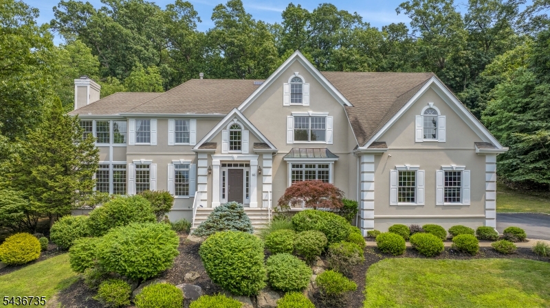 Ladies and Gentlemen... START YOUR ENGINES! This is your chance to live in one of North Caldwell's most sought-after neighborhoods. This classically beautiful center hall colonial is flooded with natural light. Thoughtfully laid out, the grand two-story foyer opens to an oversized great room and dining room with direct access through the butler's pantry to the kitchen. The open concept kitchen and oversized family room is every buyer's dream! Filled with natural light, this space is perfect for everyday living and entertaining alike. You can even dine alfresco on the expansive deck! The first floor also offers a guest suite with its own full bath. Head up the grand staircase to the primary suite, complete with its own sitting room. The three additional generously sized upstairs bedrooms each have en suite baths. On the lower level, the finished basement adds flexible space for a gym, media room, or playroom   plus a custom sauna for a true retreat at home. Out back, a sprawling level lawn framed by mature trees gives you room for everything. All close to top-rated schools, shopping, and NYC commuter routes. Repriced and ready to go...it's going to be a race to the finish line!