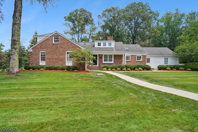 Masterfully renovated to perfection in 2024 in an ideal location on a quiet street on totally level 0.55 acre property with plenty of room for a pool in the highly rated Deerfield Elementary School District! This stunning home features great natural light with modern design, skylights & high end finishes throughout! The gourmet eat-in kitchen with skylights has crisp white custom cabinetry, top of the line appliances including Subzero refrigerator/freezer, 2 Dacor ovens, Kitchenaid dishwasher, 4 burner gas cooktop and Sharp microwave, gleaming quartz countertops, enormous living room with wood burning fireplace mantle & French doors opening to expansive bluestone patio & lush property. The adjoining dining room is perfect for entertaining. You will love the luxurious Primary Suite with lavish new bath. 2 additional bedrooms share a beautiful full bath. There is easy 1st level access to the attached 2-car garage. There is a 5th bedroom with full bath. The beautifully finished lower level features 2 oversized recreation rooms, a gorgeous media room, a large exercise room, laundry room & powder room. Plenty of space! The backyard is totally level, w/ stunning patio and lush landscaping. There is plenty of room for a pool. Ideal location close to Deerfield Elementary School, Gero Park, the town's rec center w/ youth baseball fields, the town pool, par 3 golf course, tennis & racquetball courts, and more, as well as spectacular Old Short Hills Park & Greenwood Gardens. Low Taxes!