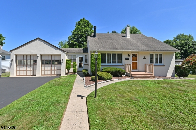 Welcome to this beautifully maintained Cape Cod-style home, featuring three bedrooms and two and a half baths, all complemented by excellent curb appeal. Upon entering, you will be greeted by a cozy living room adorned with a wood-burning fireplace. The spacious kitchen, located directly behind the living room, is designed to accommodate a large dining table, making it perfect for gatherings. Additionally, the first floor includes a full bath, a bedroom, and a dining room that can easily be converted into a fourth bedroom if additional space is required. The second level has a rear dormer and features two generously sized bedrooms, each offering ample closet space, along with an additional full bathroom. The walk-out basement boasts impressive ceiling height and includes a half bathroom, a family room, and laundry facilities. There is also extra space that can be utilized as a gym or office. In addition, the property features a two-car garage connected by a charming breezeway, which can be enjoyed year-round. Adjacent to the breezeway is a two-level deck that provides views of the manicured backyard.