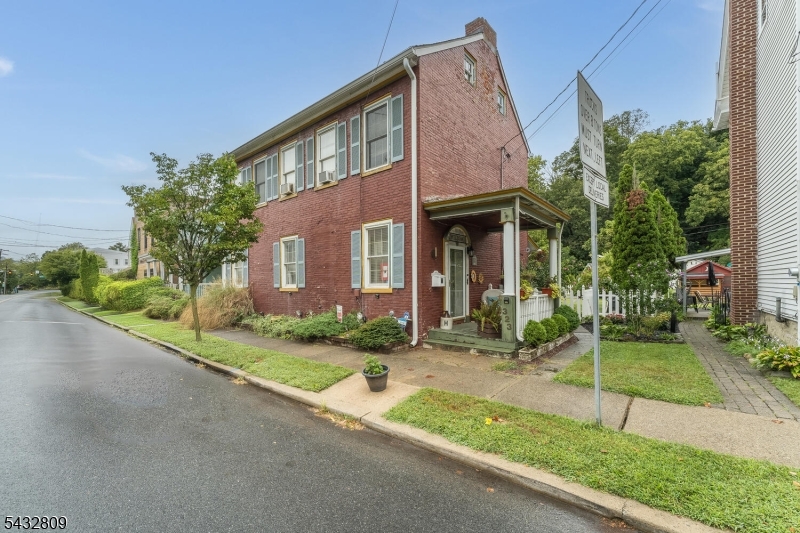 WOW!!! OFF STREET PARKING 1800's colonial in the heart of Belvidere. This timeless home offers a unique combination of historic character and RESIDENTIAL/COMMERCIAL ZONING. Features include original trim work, detailed craftsmanship, and a functional layout with formal dining room and spacious living area. The home is move-in ready with thoughtful updates throughout. Exterior highlights include a well-maintained yard, private patio,  Commercial zoning provides flexibility for a home office, professional use, or small business. Conveniently located near local shops, dining, and major commuting routes.