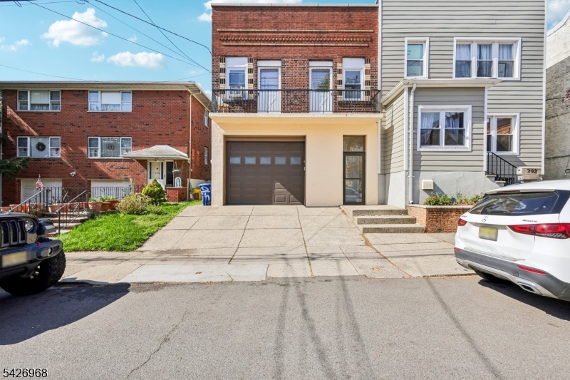 Well-maintained residence currently configured as a mother-daughter, offering excellent income potential. The second floor features a fully renovated unit with 3 bedrooms, 1 full bathroom, and great tenants generating strong rental income. The main level includes space with approved plans to expand, offering the opportunity to create an additional unit with 2 bedrooms, a full bathroom (currently half bath in place), and a kitchen. Ideal for extended living or additional rental income. Property also features a spacious backyard and 2 parking spaces, providing comfort and convenience. Prime opportunity to generate income in a desirable location.