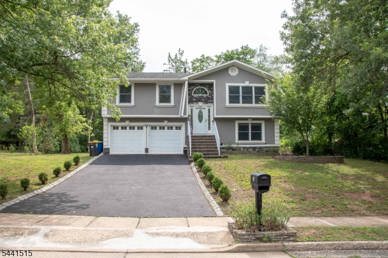 Great Location!! Ready to Move in Home! Not your average Bi-level 4 Bedroom, 2 Bath, Kitchen with Quartz Countertops, 2 Attach Garage and Park like backyard (tree lined fence for privacy) with HUGE Shed (Custom Professionally Constructed).  Upgraded Stucco siding with real stucco not EIFS, Larger upgraded Andersen windows.  (Roof 2018) (Siding 2022) Large Paver Patio & paver path in the back yard. Conveniently located near Rutgers University, shopping, restaurants, major highways, and nearby train stations. Walking distance to Middlebush Park & Inman Park.