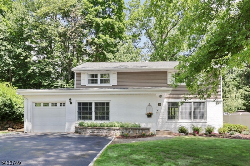 Welcome to this classic Zamore-style Colonial located on a dead-end street. This well maintained home offers charm with beautiful newly re-finished oak hardwood floors on the first floor and all upstairs bedrooms, central air, newer roof and a functional layout designed for todays lifestyle. First floor features an entry area leading into a spacious living room with wood-burning fireplace, dining room with sliding doors to backyard, kitchen wi/tile floor, plenty of cabinets and generous counter space, family room w/newer carpet, laundry area and powder room.  Second floor has 4 bedrooms, full bath and access to attic with pull down stairs. The fully finished basement provides flexible living and recreation space, storage area and utility room. Attached 1-car garage, private backyard with paver patio and storage shed..  Conveniently located near schools, shopping, restaurants, train and bus transportation.