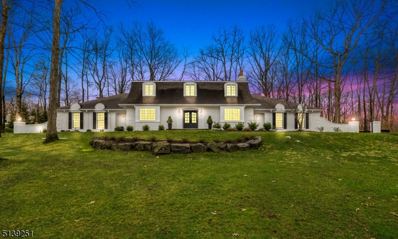 European Architect inspired Gracious custom home with  beautiful heated SALT WATER INDOOR POOL, has been updated and renovated with young & supplicated modern taste, Stylish handsome double door leads to  wonderful entry foyer, reveals well positioned rooms, dual stair cases with elegant hardwood floor throughout, warm and inviting living room with charming window seats and fire place, extra-large dining room is great for holiday dinners, newly updated kitchen is bright and scrumptious with top of the line appliances, pantry and large breakfast area overlooking courtyard backyard with stone walls, connecting to kitchen is the wonderful family room and solarium/exercise room, solarium has direct access to pool, additionally there is first floor bedroom/office with beautiful full bath, second floor has  updated master suite with fire place, private balcony and extra-large shower, there are 3 additional large bedrooms, updated two baths and another home office/den, fully finished basement has access to pool, the shower and change room to accommodate the pool house service and expansive rec-room for additional living space and storage room. This all brick home has been loved and cared with the pride of homeownership. Hot tub in back As Is, Chimney, fireplace and flues" as is" with no known issues.