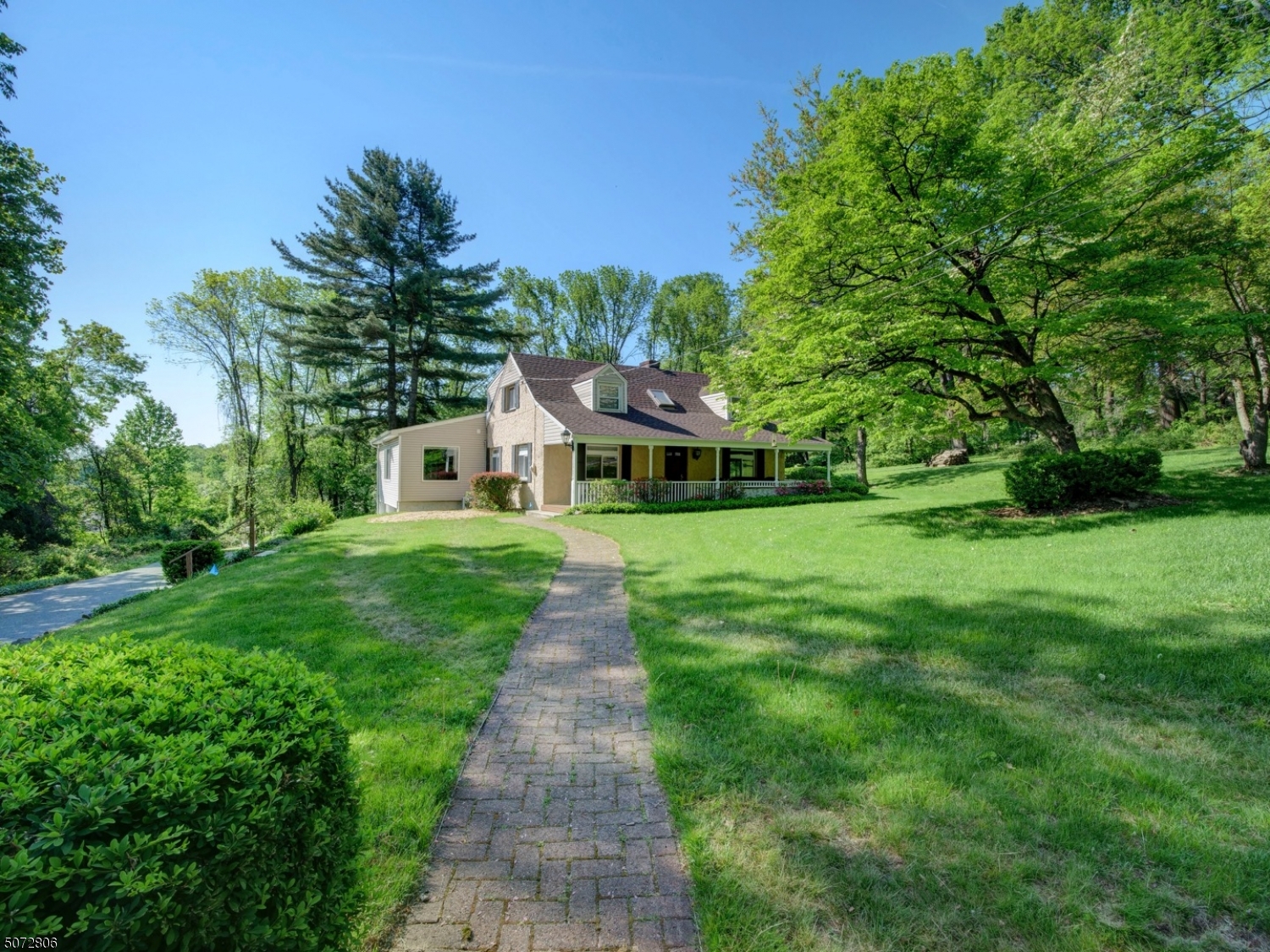 HOME SWEET HOME - 3 BEDROOM CAPE SITUATED ON 1 ACRE OF PROPERTY! ENJOY SIGHTS OF NATURE WHILE RELAXING ON THE TREX LEMONADE FRONT PORCH.  MODERN, WORRY-FREE CONCRETE MASONRY SIDING. SPACIOUS AND OPEN FLOOR PLAN WITH UPGRADED KITCHEN FEATURING GRANITE COUNTERS, NEWER APPLIANCES, BREAKFAST BAR AND SEPARATE DINING AREA / DEN.  THE 24 X 23 GREAT ROOM BOASTS LOTS OF NATURAL LIGHT AND SLIDERS THAT LEAD OUT TO THE ENTERTAINING-SIZED TREX DECK .UPGRADED POWDER ROOM.3 BEDROOMS ON THE SECOND LEVEL AND A FULL BATH WITH STALL SHOWER AND SOAKING TUB. IN THE BASEMENT, BRAND NEW ROTH ABOVE GROUND OIL TANK AND ACEESS TO THE 2 CAR GARAGE. ROOF IS APPROX 6 YEARS OLD. YOU'LL FEEL SECLUDED YET THIS HOME IS SUPER CONVENIENT TO ALL MAJOR HIGHWAYS AND TRANSPORTATION TO NYC.