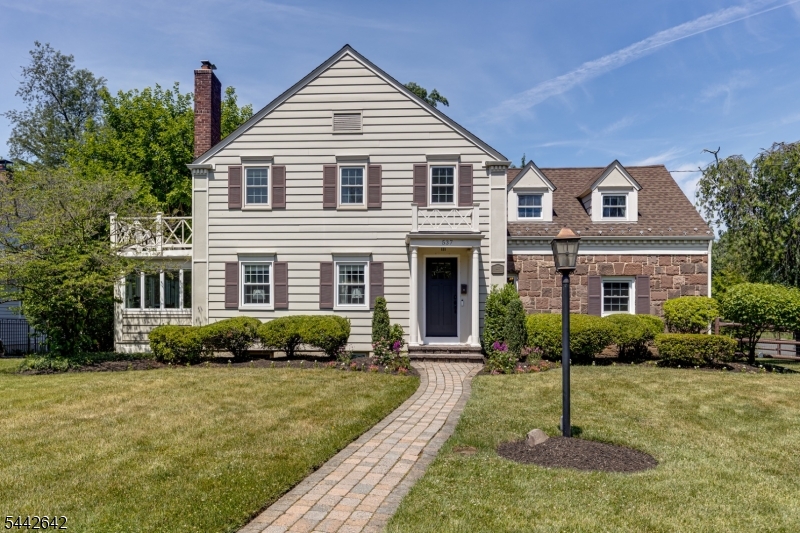 Welcome home to this classic Wychwood neighborhood charmer. Beautifully situated in a picturesque neighborhood on over a 1/4 acre of land, this home exudes charm from every angle. The first floor is light, bright, and airy, and welcomes guests to its extremely functional floorplan with open arms. The spacious living room flows seamlessly into the dining room and kitchen areas, perfect for every day life as well as entertaining. The family room is generously sized and offers a great retreat for relaxation and gathering. The kitchen opens to the back deck, which overlooks the fenced in backyard. The first floor also offers a bonus space, useful for a home office, den, or playroom. Upstairs, four generously sized bedrooms offer plenty of sleeping quarters, and the primary offers dual closets and a full en suite bath. The basement is finished with a large rec room, laundry room, and extensive storage space. The attached 2 car garage offers convenience and ease for daily life. The backyard is expansive and private, with mature landscaping. This property is a true Wychwood gem.