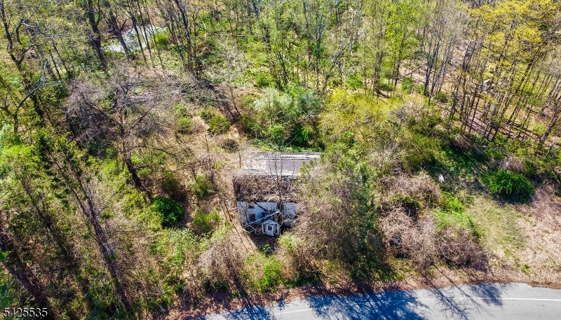 Diamond in the rough with exceptional upside in one of Rockaway's most desirable residential settings. Set on nearly an acre with approximately 270 feet of frontage on Meriden Rd, this property offers a rare opportunity to renovate, reimagine, or build new in a quiet, established neighborhood surrounded by higher-end homes. The existing home is in need of significant improvement and is being sold strictly as-is, but for the right buyer, builder, or investor, the potential here is undeniable. Whether you choose to restore the current structure or start fresh, this property offers the chance to unlock value in a location where the setting truly supports the vision. Buyers to perform their own due diligence regarding zoning, approvals, and intended use.