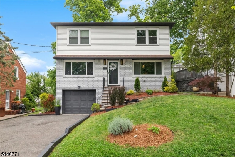 Thoughtfully renovated from top to bottom, this elegant 3-bedroom, 3.5 bath, 1981 built colonial in the Englishtown section of West Orange offers three finished floors of living. Enjoy an open concept, main level anchored by a stunning custom marble fireplace in the living room, a dining room perfect for entertaining, kitchen, and powder room. All bedrooms and two full bathrooms are located on the 3rd floor, a fully finished basement with a bonus room used as a gym, recreational space, and a full bath. The updated kitchen is appointed with stainless steel appliances including Bosch and Wifi enabled GE designer finishes that strike the perfect balance between beauty and function. Upstairs provides three generous bedroom including a serene primary suite and hall bath. Each bedroom has custom organizers for ease of storage. The finished basement expands your living space effortlessly, while outside a brand new Trex deck and exterior facelift deliver exceptional curb appeal. The backyard, exclusive for entertaining.The roof was replaced in 2019 and this home is truly move-in ready. Englishtown is one of Essex County's most serene neighborhoods! The location is equally impressive. Direct highway access to I-280, the Garden State Parkway to I-78, and I-95 keeps every destination within reach. NYC commuters benefit from the jitney (route 4 line) to area Midtown Direct train stations and bus routes, making the city easily accessible. Come and make 11 Nottingham Rd your new oasis.