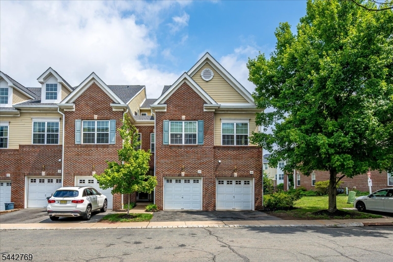 Welcome to this well-maintained 2-bedroom, 2.5-bath townhome located in the heart of historic Morristown, offering comfort, convenience, and an exceptional location.The main level features an open-concept layout with spacious living and dining areas, beautiful hardwood floors, and a kitchen that flows seamlessly into the main living space. A powder room and an attached one-car garage add everyday convenience.The second level includes a spacious primary bedroom with a large closet, an en-suite full bathroom, and sliding glass doors leading to a private balcony. A second bedroom, an additional full bathroom, and a conveniently located laundry and utility room complete the upper level.Conveniently located just around the corner from the Morristown NJ Transit Station with Midtown Direct service to New York City, the home also offers easy access to Routes 287, 24, 80, and 280. Approximately one-half mile from downtown Morristown, you'll enjoy close proximity to restaurants, shopping, parks, cultural attractions, and everyday conveniences.This townhome offers low-maintenance living in one of New Jersey's most sought-after communities, combining a functional floor plan with an outstanding location.