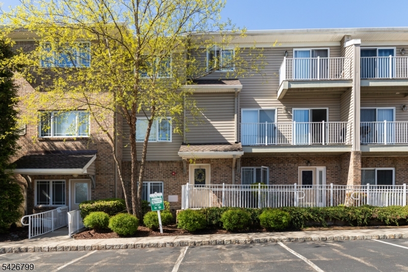 Experience tranquility in this stunning 3 Bed 3.5 Bath condo located in the highly desirable Kinnelon Heights 55+ community. Designed for those who appreciate an active yet peaceful lifestyle, this residence offers a seamless blend of modern updates and charm. The main level includes an updated gourmet kitchen which flows effortlessly into the dining and living areas, perfect for hosting friends or enjoying a quiet evening by the fire or on the balcony. The upper level features two spacious bedrooms, highlighted by a primary suite with its own private balcony. The ground floor features a secluded third bedroom with a full ensuite bath to provide the ultimate privacy for guests, a quiet home office, or a cozy den. 2 Assigned parking spaces and ample parking for guests. A must see unit!