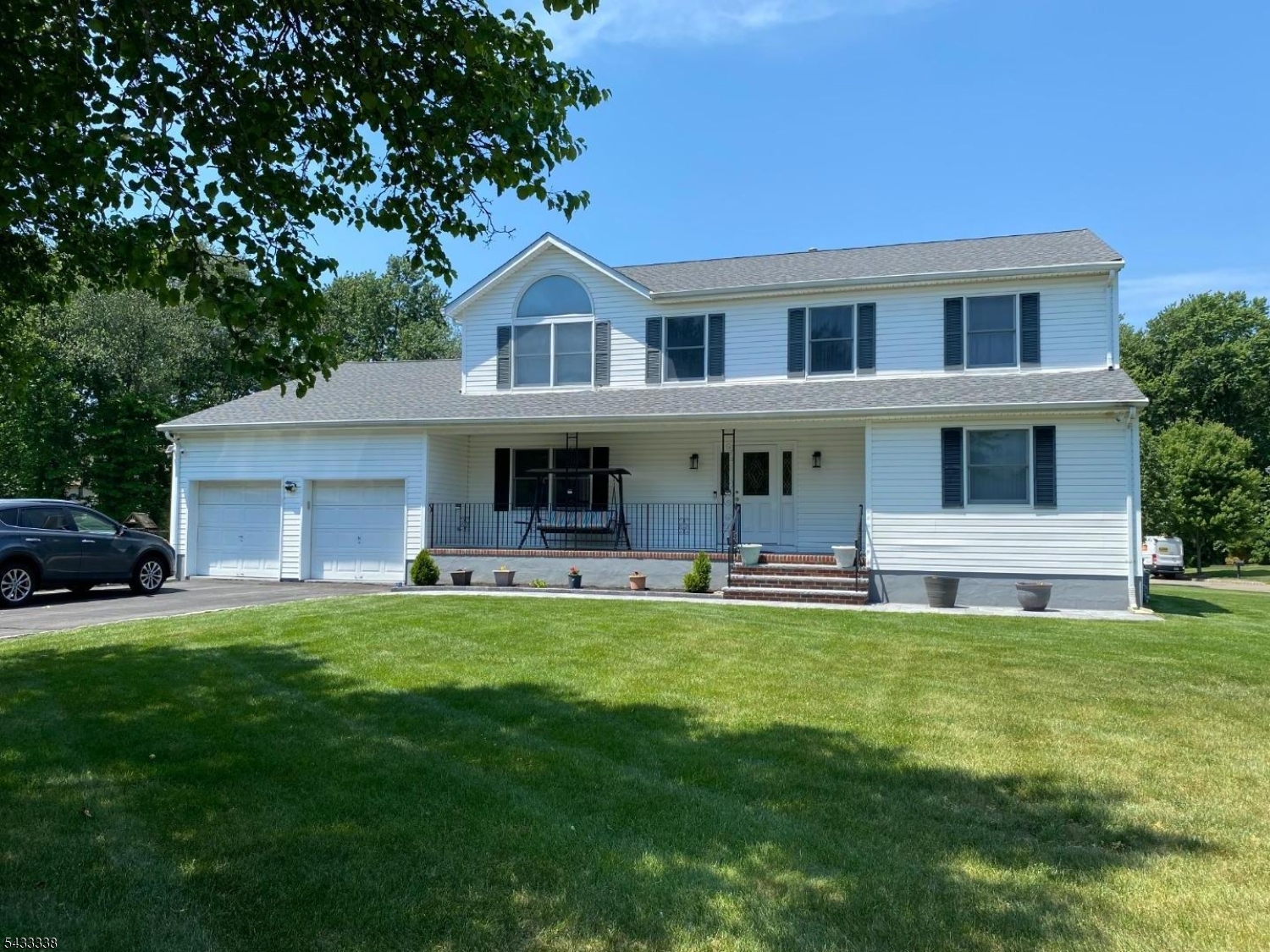 Young 4 BR 2.5 BA spacious Colonial, original owner, updated kitchen ,granite counter top, marble backsplash, SS appliances, recessed lights thru out, kitchen & family room sliders to  rear deck, hardwood floors, marble floor in entry foyer, washer, dryer off kitchen, Primary BR vaulted ceiling, Primary bath stall shower ,extra room off of Primary BR, ceiling fans throughout entire home,  multi zone underground sprinklers, lovely open front porch to enjoy , inside & out security system, 2 car garage enters to kitchen, full finished basement with shelved large storage room, freezer in basement to stay, driveway accommodates 5-6 cars, school bus available from elementary to high school.