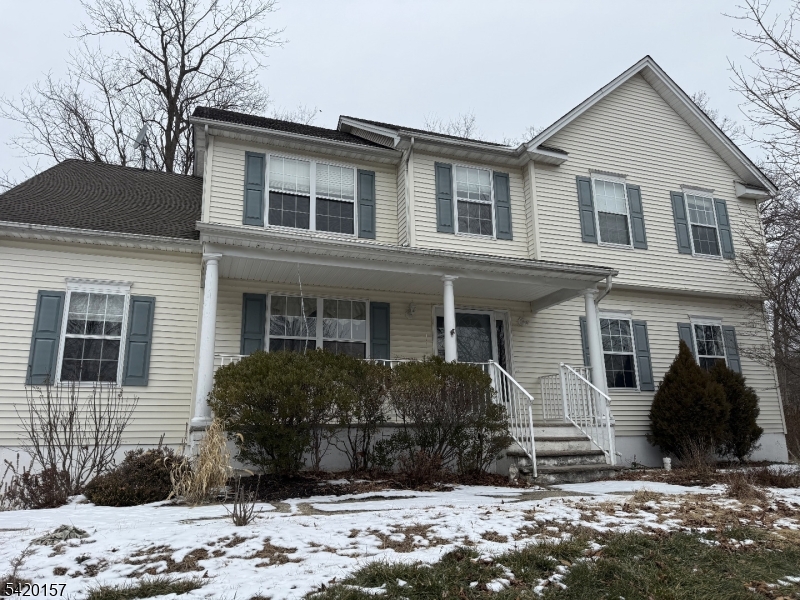 Bring your contractor. Located in Mansfield Township on over half an acre, this five-bedroom colonial is ideal for buyers seeking a renovation project. Highlights include a two-car garage, finished basement, spacious kitchen, and family room with fireplace. The main floor also offers a living room, dining room, laundry, and full bath. Upstairs, three bedrooms, a second bathroom, and a master suite with walk-in closet, large bathroom, extra versatile room, and attic are featured.Built in 2000 this 2,638 sq ft home includes five bedrooms, three full and one half baths, open floor plan, formal living and family rooms with gas fireplace, and access to a private backyard with deck. The kitchen has granite counters and a breakfast area, plus laundry on the main level. All bedrooms upstairs have walk-in closets, including a primary suite with jetted tub and double vanity. The lower level features rec room, utility room and direct garage access.