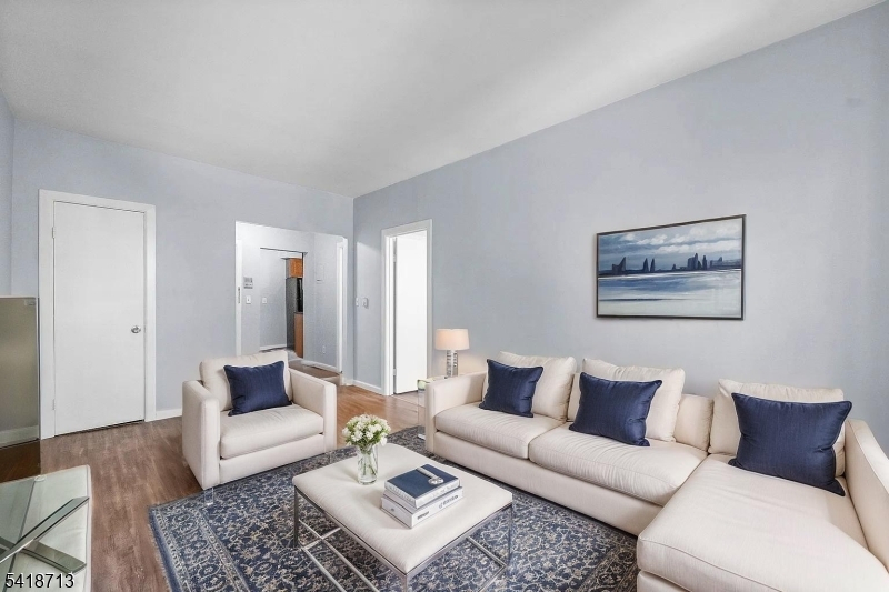 Charming 1-bedroom, 1 bath condo features an inviting open-concept, layout filled with natural light, offers spacious living areas, a modern kitchen with granite countertops and glossy black appliances. Located near Lincoln Park, it provides access to outdoor activities, shops, restaurants and transportation option to NYC.