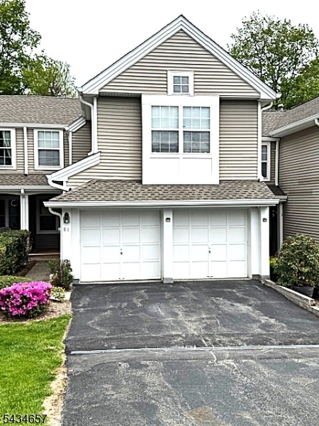 Easy townhome living in a convenient location! This spacious townhome offers a 2-car garage, finished basement perfect for a recreation room, home office, gym, or guest space. Rear offers a view of a wooded area beyond Enjoy a bright and comfortable layout with low-maintenance living. Conveniently located near Route 10 with easy access to shopping, dining, and commuter routes. A great opportunity to enjoy comfort, convenience, and extra living space all in one!