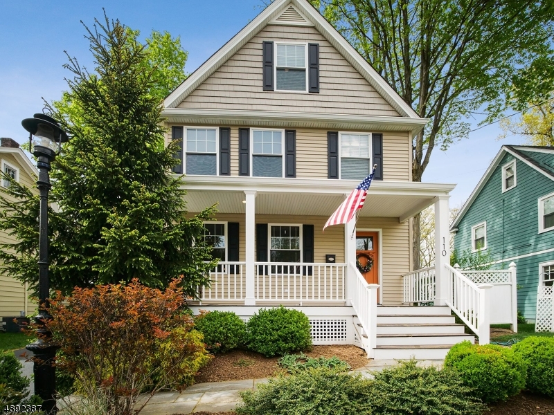 Modern style and old world charm beautifully executed in this 4 story updated Madison colonial. Hardwood floors throughout, lovely appointed living room and formal dining room. Hallway leads to powder room and beautiful kitchen with all stainless steel appliances, center island, granite throughout and a breakfast room. Next to kitchen is the side entrance with a much desired mud room. Finishing the first level is a gorgeous family room with stone fireplace and sliders to patio. Second level has master bedroom/bath and custom closet. 3 more bedrooms, a full bath and laundry room complete this floor. The third level has a bonus rec room and additional storage rooms. A 2 car garage and large level lot are an added bonus. Close proximity to NYC train and all 3 schools. Beautiful property!