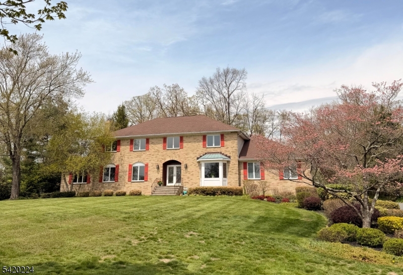Back on market due to buyer none performance.  Great opportunity to own this spacious and stately brick front Colonial on 1 acre+ level property! 4 bedroom, 3 full baths, 2 fire places and 3 car garage. Cul-de-sac location in the Ironia section of Randolph!  From the 2 story entry floyer, a curved staircase leading to the 2nd floor. 4 good size bedrooms 2nd floor with wall to wall carpet over hardwood floors underneath. You will be impressed with the Large Mstr Bdrm w/wlk-in clst, sitting area. Updated Mstr Bth featuring double sink, shower and separate jacuzzi tub. Bathroom hallway also updated. The Fm Rm features frplc, sliders to the oversized deck, and parklike level backyard. Updated and generously proportioned eat in kitchen open to family room.  This lovely home will accomodate large gatherings and provide all the comforts and conveniences you desire in a home!