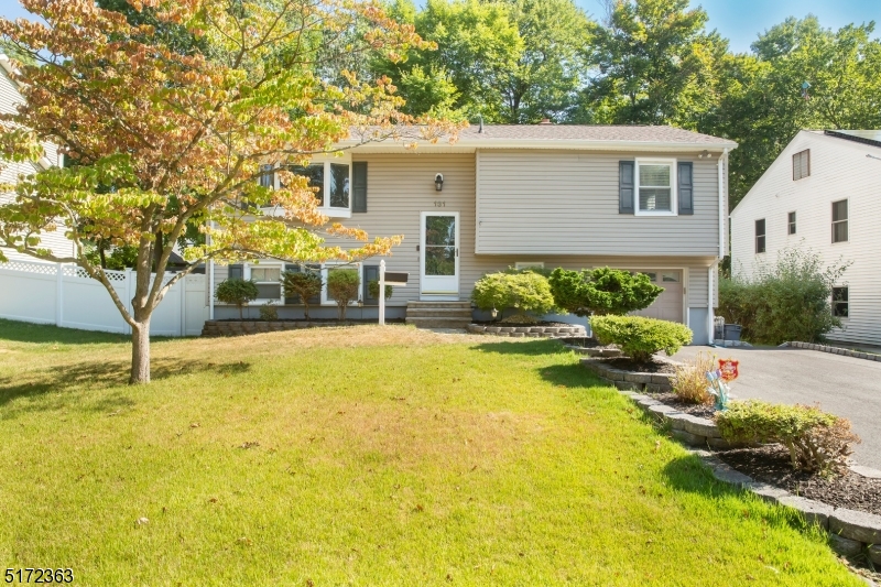 Expect to be impressed with this well cared for home with fenced in yard! Great curb appeal! Newer Driveway 2020,A/C 2018, hw floors, Hot water heater, both bathrooms, Roof in 2015, Open kitchen dining room living room concept. Meticulously maintained. The hardwood floors just gleam!  The lower floor has huge family room with an area to make a fourth bedroom, sliding glass doors to flat back yard. There is a full bath on this level, Plus one car garage. The driveway is double and room for 4 cars. To show this home is to sell it!!Highest and Best Terms by Monday at noon